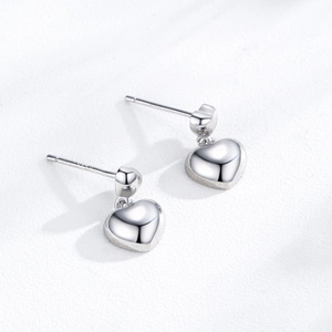 Minimalist S925 sterling silver heart stud earrings with a polished mirror finish surface