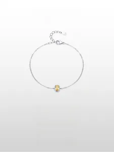 Detail of S925 sterling silver chain with oval amber zircon and material hallmark