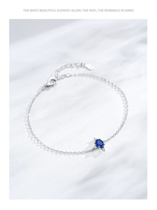 Macro detail of S925 sterling silver stamp on vintage blue zircon star bracelet