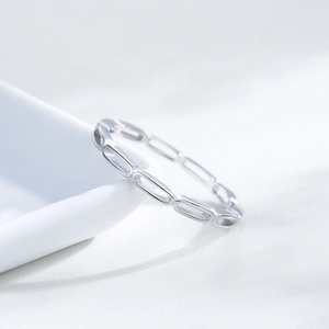 Minimalist S925 sterling silver hollow chain link ring with polished finish on white dish