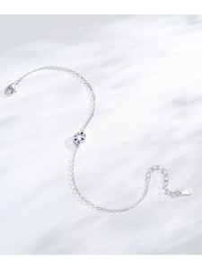 Macro detail of S925 sterling silver snail bracelet with colorful zircon palette and clasp