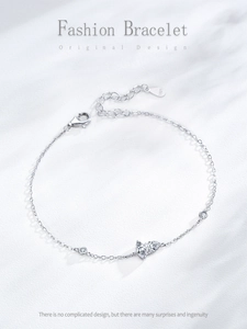 Detail of S925 sterling silver butterfly bracelet with sparkling zircon stones