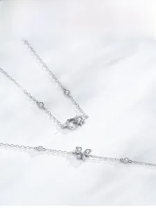 Detailed view of S925 silver bracelets with moon, star and butterfly zircon charms
