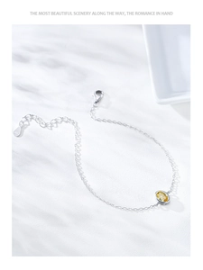 Vue détaillée de la chaîne en argent S925 avec zircon jaune et poinçon de pureté