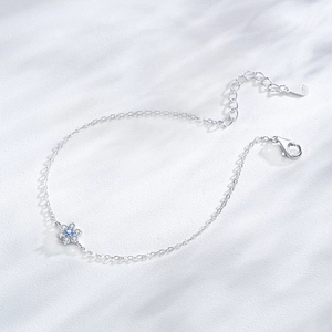 Elegant S925 sterling silver flower bracelet with blue gemstone and white zircon stones