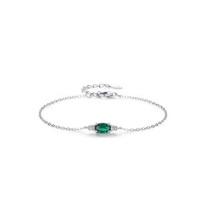 Vintage S925 sterling silver bracelet featuring an oval green gemstone with side stones