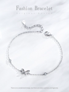 Close-up of S925 sterling silver butterfly bracelet with sparkling zircon stones