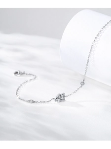 Detail of S925 sterling silver chain bracelet with geometric square clear gemstones
