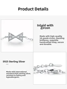 Detailed view of S925 sterling silver bow charm with zircon and adjustable lobster clasp