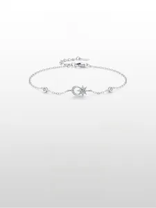 Detailed macro view of S925 sterling silver sun and moon bracelet with zircon stones