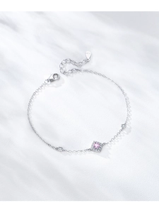Detail of S925 sterling silver bracelet with pink zircon stone and lobster clasp
