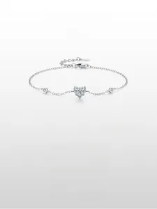Macro shot of S925 sterling silver heart bracelet with sparkling cubic zirconia stones