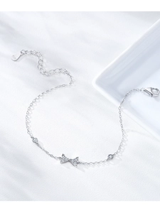 Detail shot of S925 sterling silver bow bracelet with zircons and hallmark stamp