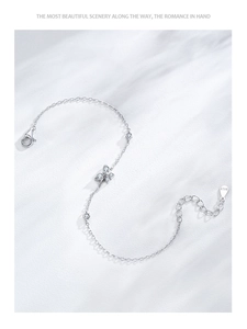 Detailed close-up of S925 sterling silver sun and moon bracelet with zircon inlays