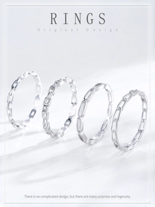 Detail view of S925 sterling silver geometric rings set with engraved hallmark