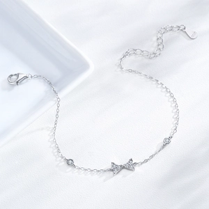 Elegant S925 sterling silver bow bracelet with sparkling zircons and adjustable chain