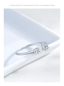Macro view of adjustable S925 silver ring featuring round and pear-shaped zircon stones