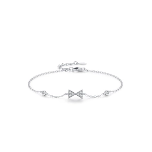 Elegant S925 sterling silver bow bracelet with sparkling cubic zirconia on white background