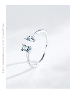 Detailed view of silver S925 ring featuring pear and emerald cut zircon stones