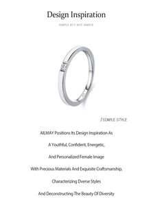 Close-up of S925 sterling silver ring featuring a small round crystal and metal hallmark