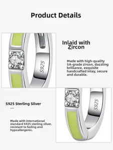 Detail of S925 sterling silver ring with green enamel finish and 5A zircon stone