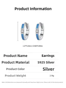 Macro detail of S925 silver hoop earrings with blue enamel glaze and cubic zirconia