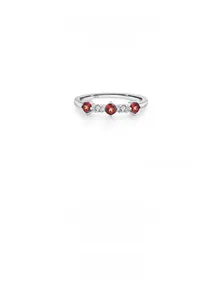Detailed close-up of S925 sterling silver ring featuring three red round gemstones and zircon