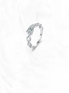 Detail of S925 sterling silver chain-link ring with pear-cut zircon stone