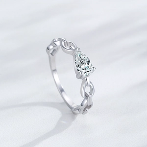 S925 sterling silver chain ring featuring a pear-cut zircon stone and hollow band