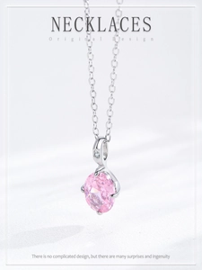 Detailed macro view of the pink oval zircon pendant with 925 sterling silver chain
