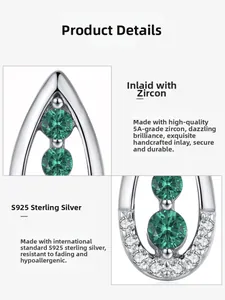 Macro detail of S925 sterling silver earrings with green and white 5A cubic zirconia stones