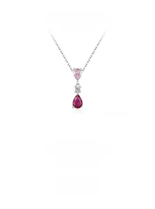 Macro detail of S925 silver necklace featuring pink teardrop gems and refined craftsmanship