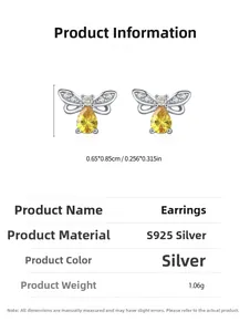 Détail macro de boucles d'oreilles abeille en argent S925 avec pierre jaune et diamants
