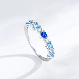 S925 sterling silver ring with five gradient blue heart gemstones and white zircons