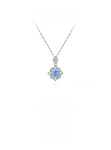 Macro view of S925 silver necklace featuring a snowflake pendant with blue zircon center