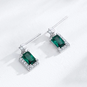 Vintage S925 sterling silver drop earrings with emerald green zircon in halo setting