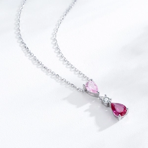 Elegant S925 silver necklace with pink and red pear-shaped gemstones on white background
