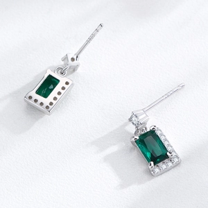 Vintage S925 sterling silver stud earrings featuring green zircon and geometric square halo