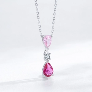 Elegant S925 sterling silver necklace featuring gradient pink pear-shaped stone pendants