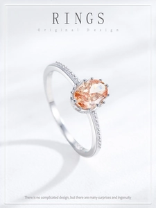 Macro detail of S925 silver ring featuring an oval champagne zircon and beaded texture