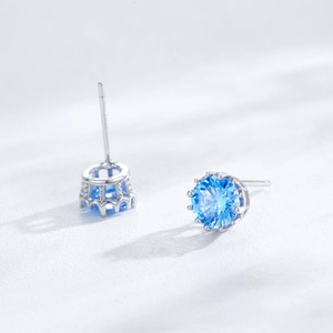 Minimalist S925 sterling silver stud earrings with round sky blue zircon in crown setting