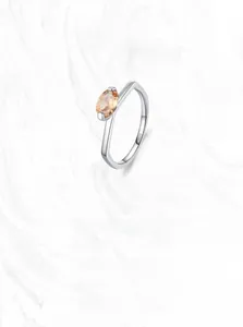 Detail of S925 sterling silver stamp on champagne marquise-cut zircon ring