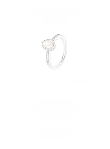 Detailed macro view of S925 sterling silver ring with oval champagne cubic zirconia