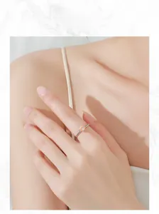 Detail of elegant S925 silver ring featuring an oval champagne zircon on a slender band