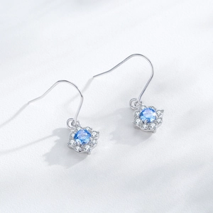 Elegant S925 sterling silver drop earrings with sea blue zircon flower pendant design