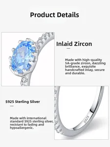 Detailed macro view of S925 sterling silver stamp and blue zircon claw setting on ring