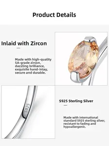 Macro detail of S925 sterling silver ring showing hallmark and champagne zircon inlay