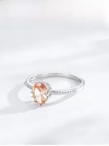Detail view of oval champagne zircon ring with vintage beaded S925 silver band