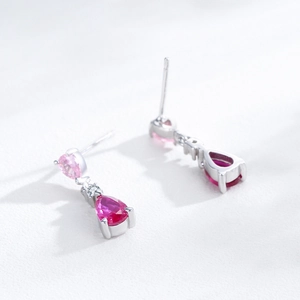Elegant S925 sterling silver drop earrings with pink pear-cut crystals and a silver finish