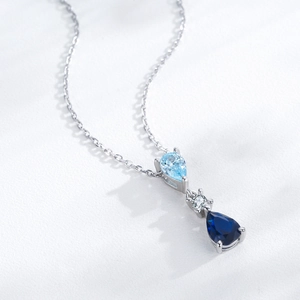 Elegant S925 sterling silver necklace with blue teardrop zircon pendant in vintage style